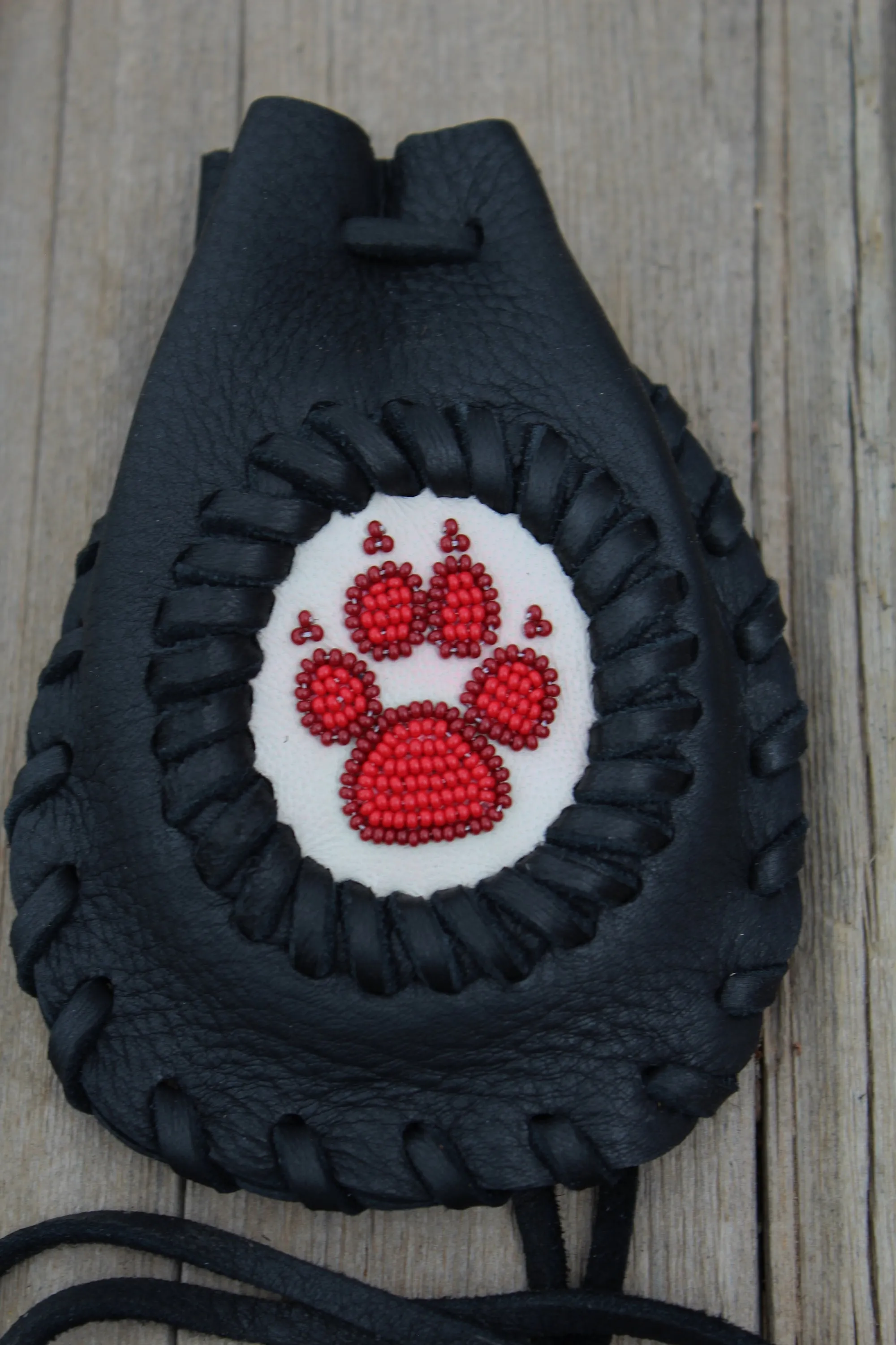 Beaded wolf paw medicine bag, leather medicine pouch