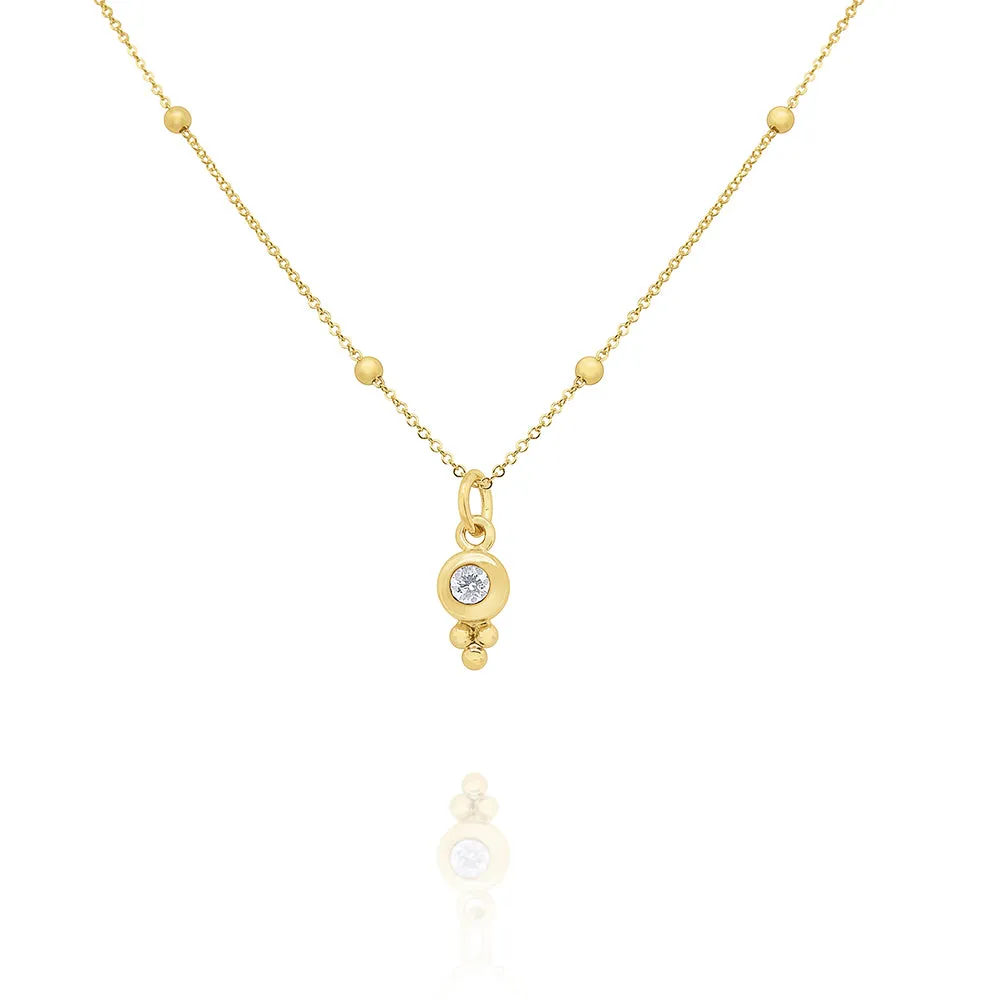 Bezel Diamond Solitaire and Trio Gold Accent Necklace